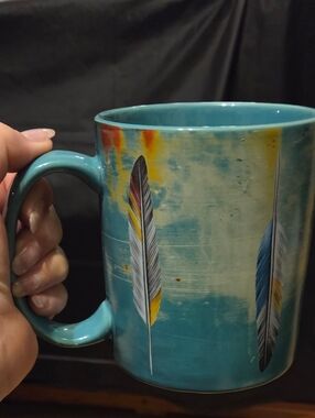 HiEnd Accents Southwestern-style ceramic mug featuring a tossed feather design.